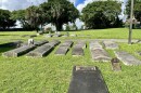 Many markers at the historic Black cemetery in West Palm Beach, Evergreen, lie above ground, though several no longer identify who is buried there. (Photo: Holly Baltz/Stet)