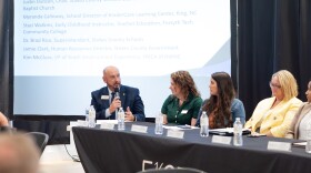 Stokes County Schools Superintendent Brad Rice speaks on a childcare panel discussion Monday morning.