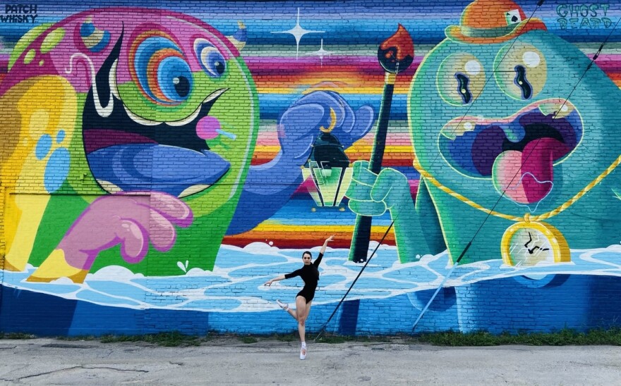 Dancer Danielle Fu performs in front of a mural by Patch Whiskey and Ghostbeard for the Instagram series "Dancing With Murals."
