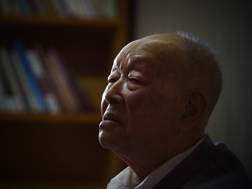 Zhou Youguang sits at home in Beijing, in 2015. Born when a Qing dynasty emperor was on the throne, he went on to help invent the Pinyin writing system used for transliterating the Chinese alphabet.