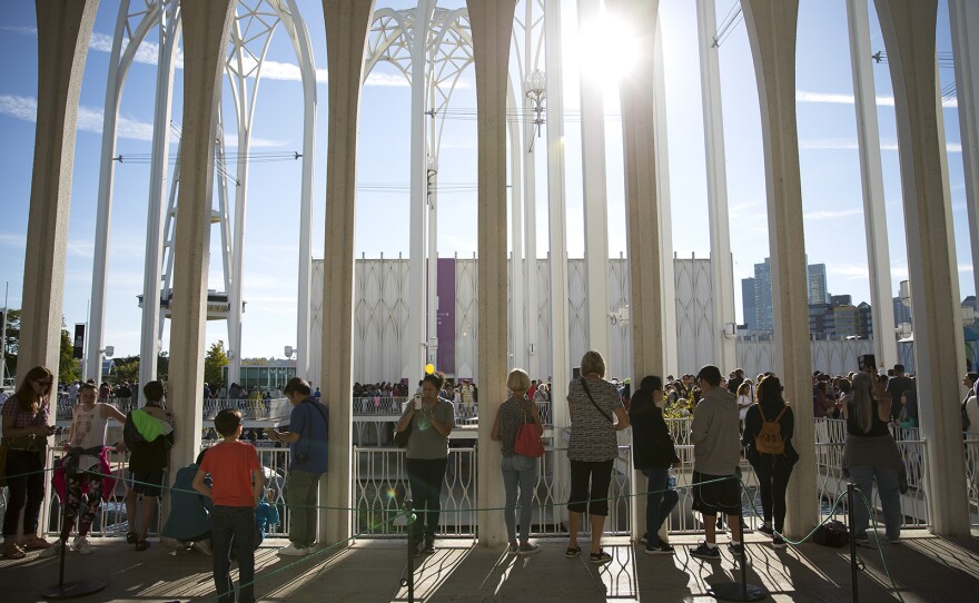 Museum goers test out their eclipse glasses on Monday, August 21, 2017, at the Pacific Science Center before the start of the solar eclipse, in Seattle. KUOW Photo/Megan Farmer