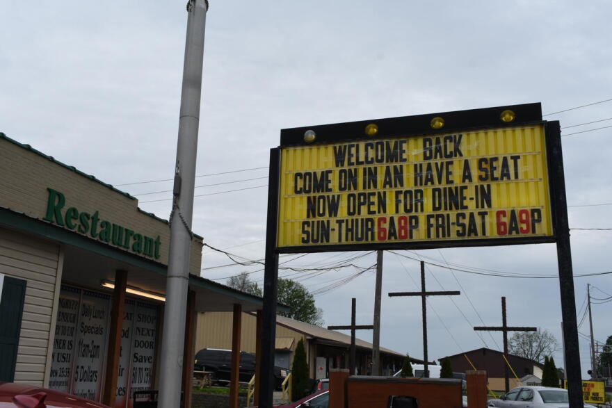 A sign outside the Liberty Bell Restaurant in Liberty, Indiana welcomes customers back after closing briefly in accordance with Indiana's COVID-19 regulations.