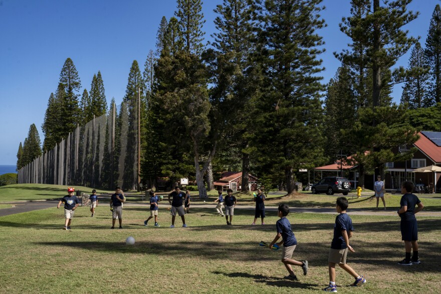 Sacred Hearts School third grade students during recess at a golf course at Kapalua Resort on Tuesday, Oct. 3, 2023, in Lāhainā, Hawaiʻi. (AP Photo/Mengshin Lin)