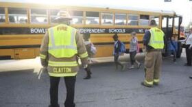 Bowling Green students who were riding a bus involved in an accident are transferred today to another bus with the help of Bowling Green firefighters at Russellville Road and Veterans Memorial Lane. Several students were transported to an area hospital.