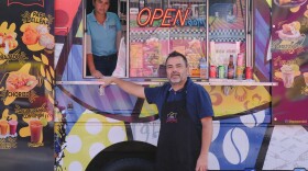Paulo Echeverry and Dahianara Lopez Zapata, at their food truck in Kissimmee, Fla.