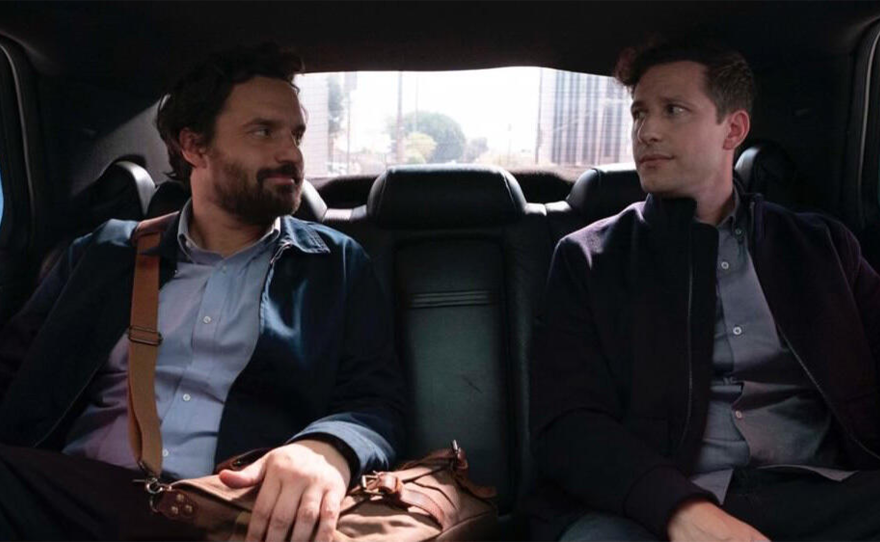 Tommy (Jake Johnson) and Andy Samberg (as himself), shown.