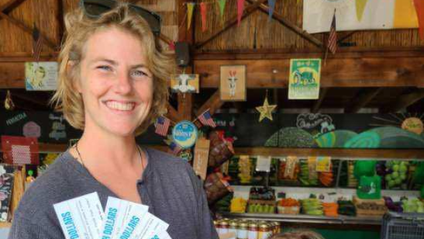 Receiving a total of $20 vouchers to use on Florida produce at Pensacola's The Farm on Mobile Highway
