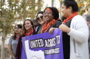 Abortion rights advocates pose for a photo outside the U.S. District Court in Austin.  The court is weighing whether abortion funds and health care providers can challenge restrictions to abortion access. 