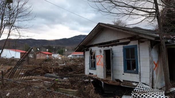 A home is standing but uninhabitable along the Swannanoa river on Good Loop Road.