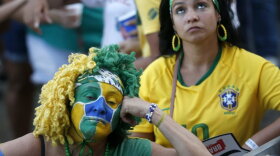 ONCE PROUD: Dejected Brazilian fans after their team's loss to Belgium last week at the World Cup in Russia.