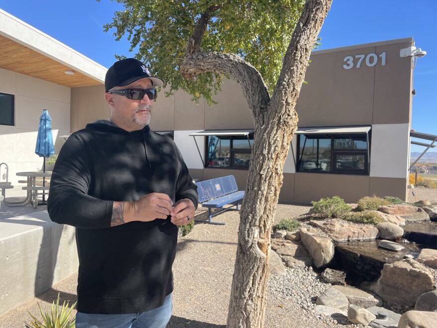 David Burke stands in front of Serenity Mesa, a recovery center in Albuquerque for young people that he co-founded.