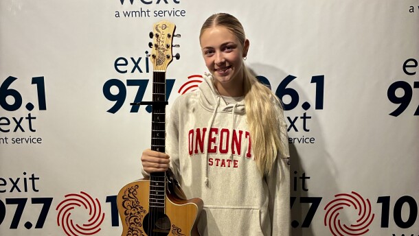 Hannah Coffin and her guitar at WEXT