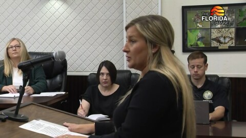 Shawna Beach is at a podium speaking to the Taylor County legislative delegation