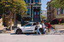 people get into a white car