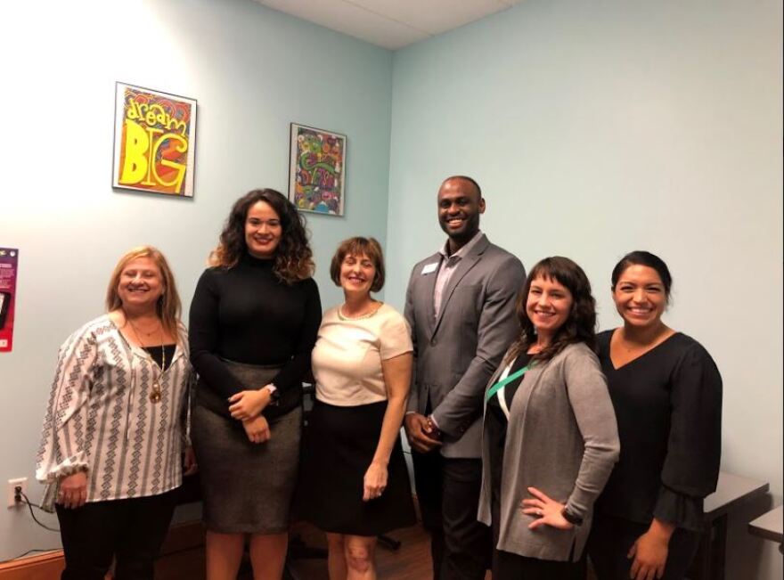 Kathy Castor (center) poses with a members of  Florida Covering Kids and Families and the Childrens Board of Hillsborough County. 