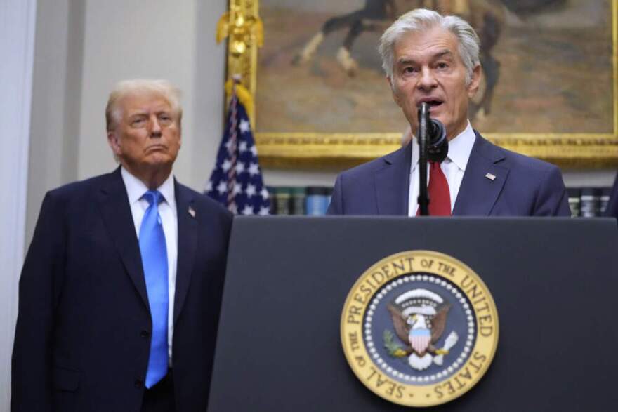 President Donald Trump listens as Centers for Medicare & Medicaid Services administrator Dr. Mehmet Oz, speaks in the Roosevelt Room of the White House, Monday, Sept. 22, 2025, in Washington. (Mark Schiefelbein/AP)