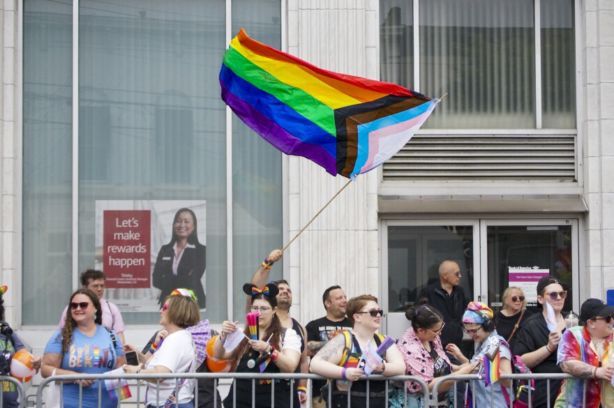 Residents crowd the downtown streets for the Huntington Pride parade on June 11, 2023.