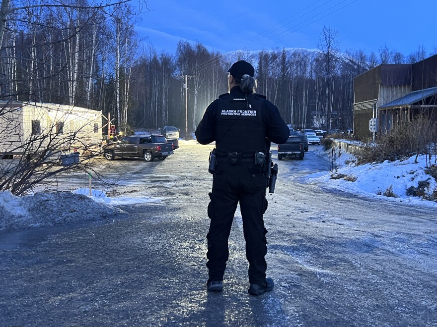 Security guard stands at entrance of the new Chin'nan Gaming Hall, which opened on Monday in Birchwood.