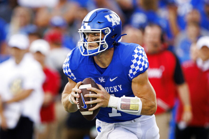 Kentucky quarterback Will Levis looks for a receiver during the first half of the team's NCAA college football game against Miami (Ohio) in Lexington, Ky., Saturday, Sept. 3, 2022. (AP Photo/Michael Clubb)