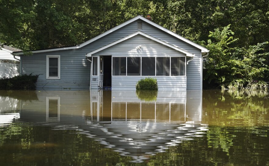 A flooded home is seen in Indianapolis, Sunday, Aug. 16, 2026.