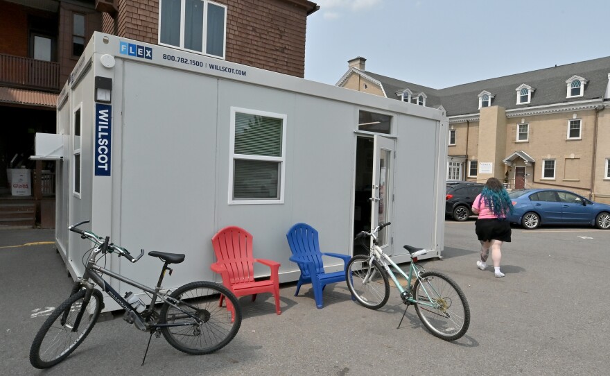 A modular unit behind 25 N. River St. offers daytime case management and other homeless services. Volunteers of America runs the Give Hope outreach program.