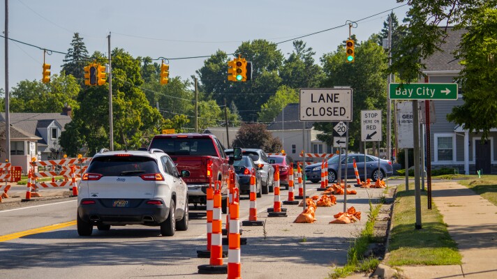 Road construction causes heavy traffic congestion at a busy intersection in Midland, Michigan on Tuesday, July 14, 2026.