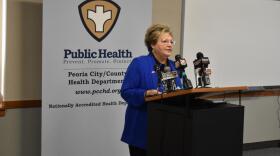 Carol Merna, CEO of the Center for Prevention of Abuse, speaks at a press conference on March 24, 2020 in Peoria.