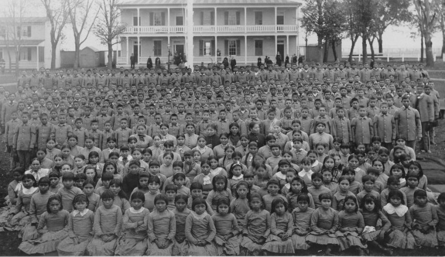 Students in front of School Superintendent Richard Henry Pratt's headquarters at the Carlisle Indian School, 1885.