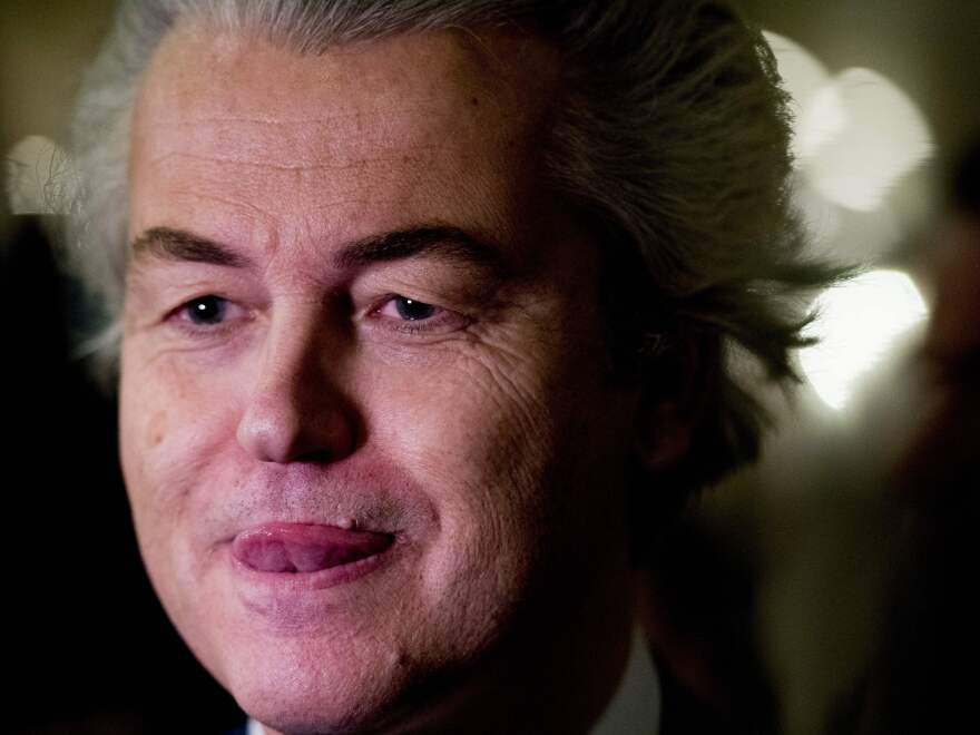 Geert Wilders speaks to the press on election night in The Hague, as returns showed the Liberal party of Dutch Prime Minister Mark Rutte set to win the most seats in the legislature.