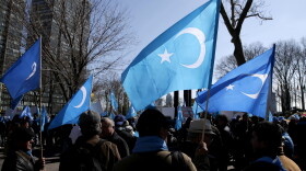 Uighurs and their supporters rally across the street from United Nations headquarters in New York on March 15, 2018 to protest a sweeping Chinese surveillance and security campaign that has sent thousands of their people into detention and political indoctrination centers. (Seth Wenig/AP)
