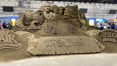 A large sand sculpture commemorating the 250th anniversary of the Declaration of Independence inside the Center of Progress building at the New York State Fair.