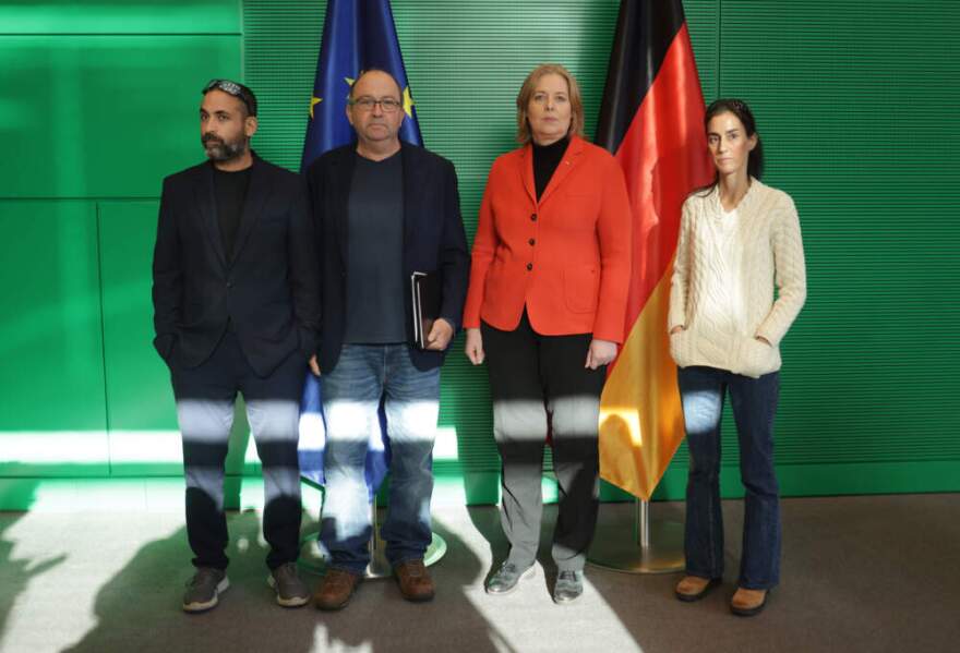 Family members of Israeli hostages in Gaza, including Batsheva Cohen (R), Avihai Brodutch (L) and Gilad Kormgold, arrive for talks with Bundestag President Baerbel Bas (in orange jacket) on Nov. 16, 2023 in Berlin, Germany. The three are in Berlin to seek German assistance in attaining the release of the hostages. (Sean Gallup/Getty Images)
