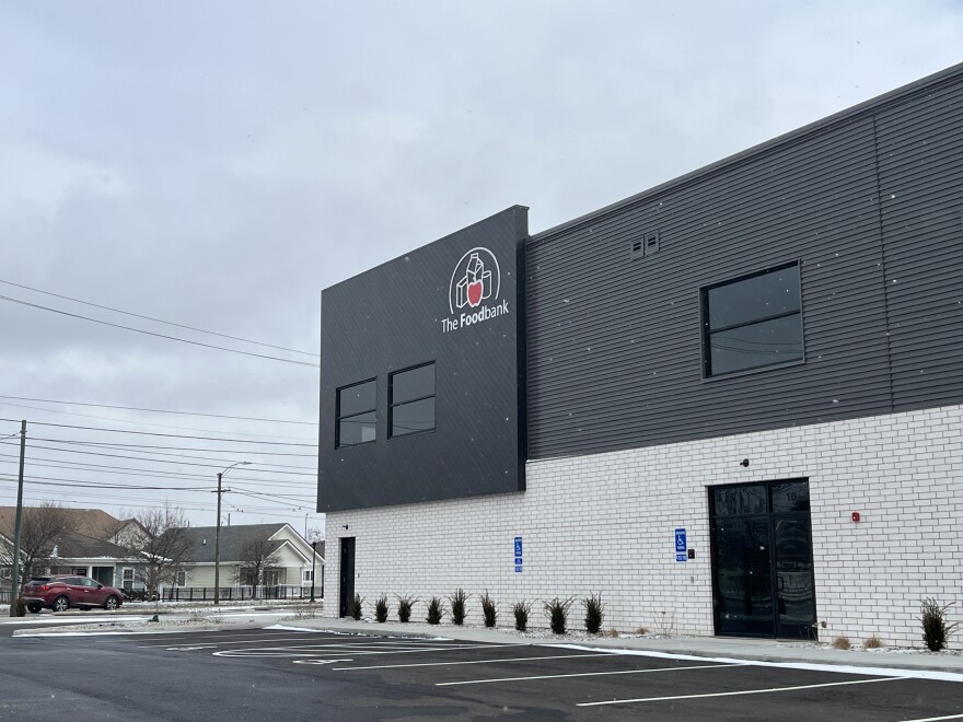 Snow falls outside the new community building at The Foodbank Inc. 