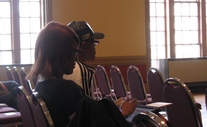 Sharon Parker takes notes during Schmidgall's sermon. Parker says she had been praying for a church like Middle Tree for five years.