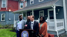 (From left) Rebuilding Together Board of Directors Chair Janice Castle, Executive Director Don Chapman, Hartford Mayor Luke Bronin, and Hartford resident Crystal Van Allen speak at a press conference previewing an event where 20 Hartford homes will be spruced up by the nonprofit.