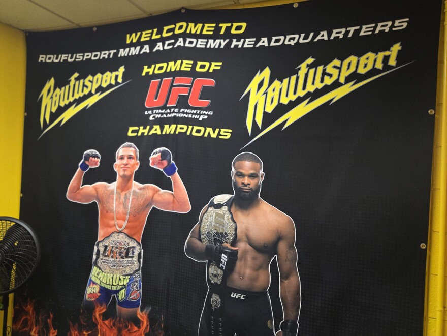 A banner at Roufusport of UFC champions Anthony Pettis (left) and Tyron Woodley.