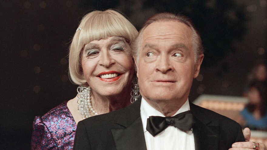 Milton Berle, in drag, performs a skit with Bob Hope during taping of the <em>Bob Hope Buys NBC</em> special at NBC Studios in Burbank, Calif., in 1985.