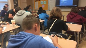 Freshmen in a classroom in Licking Heights High School work on an assignment.