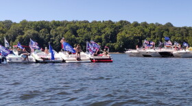 Boats decked out with Trump flags gathered at the Lake Monroe dam before the parade began.