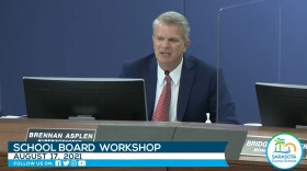 Superintendent Brennan Asplen speaks without a mask at a Sarasota school board meeting