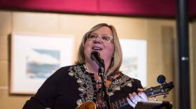 Maureen Rich singing and playing ukulele