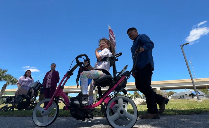 Robbie’s Riders, Grampy’s Charities and Sanibel Captiva Community Bank presented custom-made, adaptive bicycles and tricycles to local special needs children. Eight adaptive tricycles, worth nearly $3,000 each, were given out on Friday, March 20, 2026.