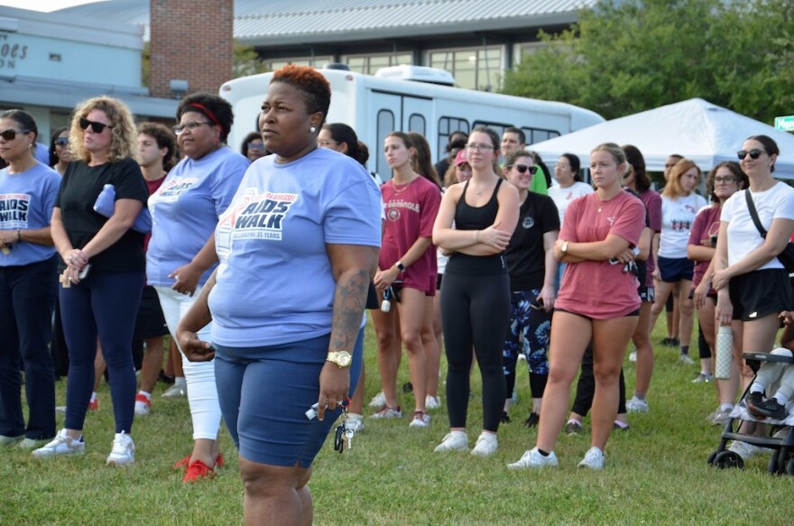Participants take part in an HIV/AIDS awareness event held by Big Bend Cares in Tallahassee.