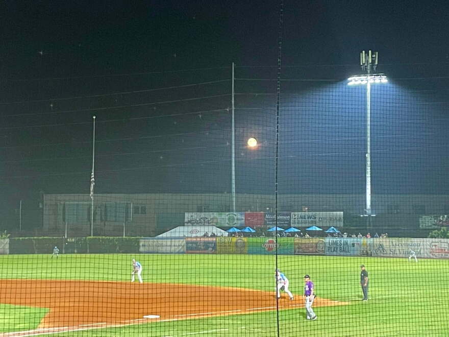 The moon rises over Evansville's Bosse Field during an Otters game, Aug. 29, 2026