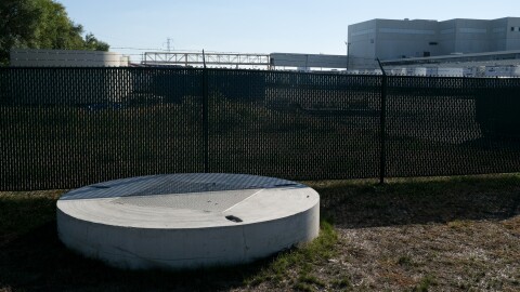 A new and improved pipe, in the foreground, brings wastewater directly to the Kalamazoo Water Reclamation Plant from the Graphic Packaging International factory, visible in the background. After sealing the pipe last October, hydrogen sulfide emissions from the plant has slightly decreased according to a January study from the Michigan Department of the Environment, Great Lakes and Energy.