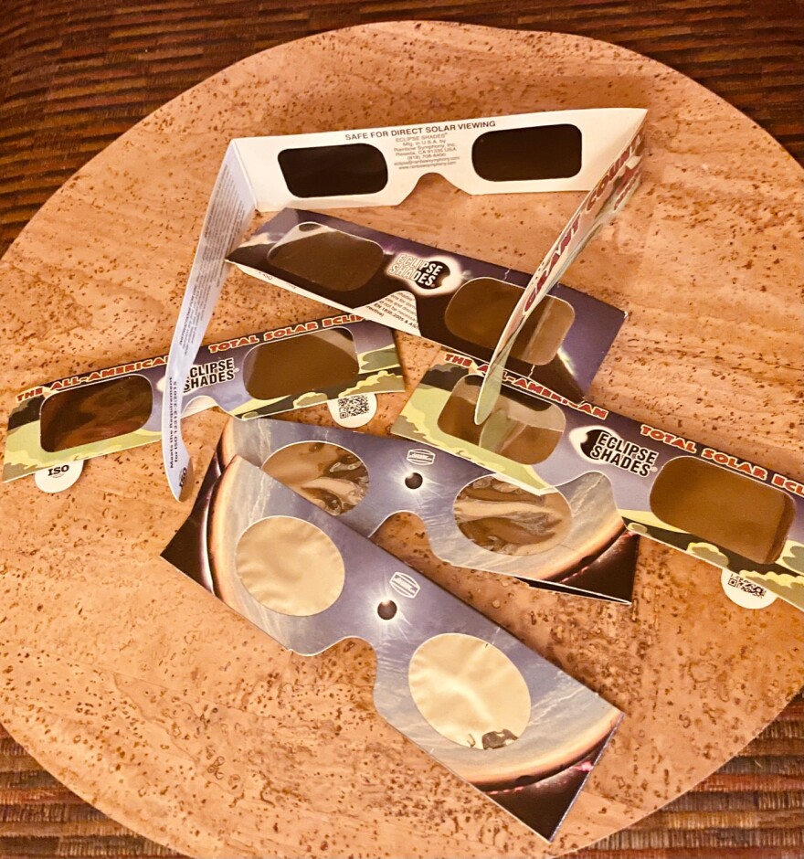 A pile of solar eclipse glasses.