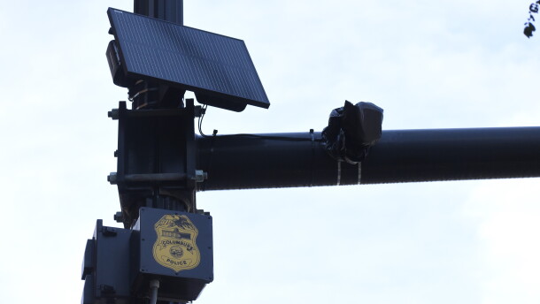 A Flock Safety automatic license plate camera at the corner of 5th Avenue and North High Street was covered with a plastic bag on September 4, 2026 by the Columbus Division of Police after Mayor Andrew Ginther suspended the use of the surveillance technology.
