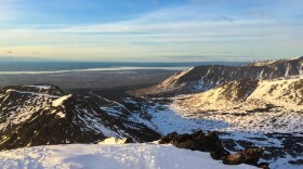 View of Anchorage behind Peak Three in the Spring. Sarah Glaser/Stock Photo.