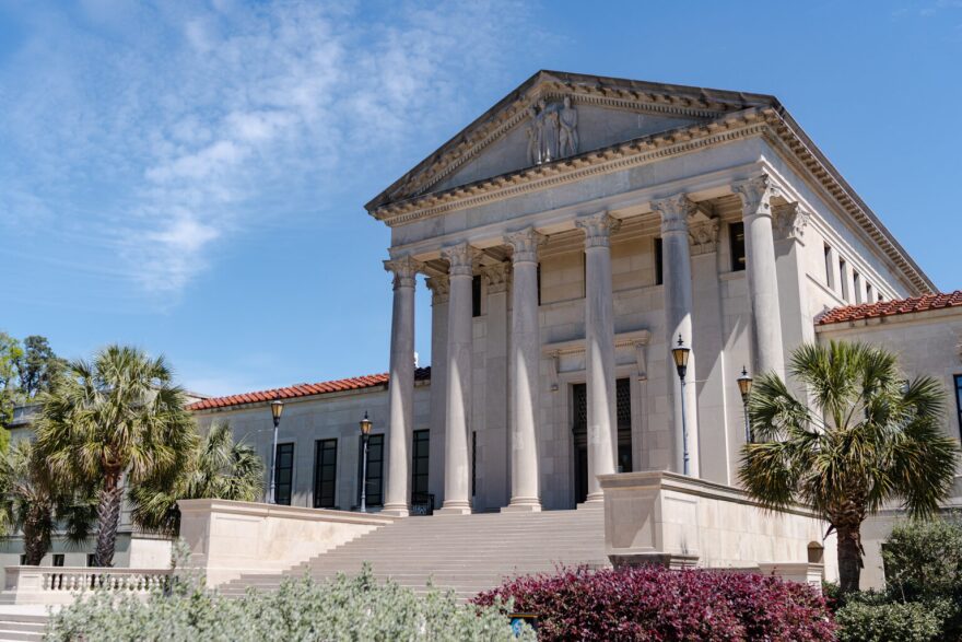 Clouds pass above the LSU Law Center on Monday, March 20, 2023, on Highland Road in Baton Rouge, La.