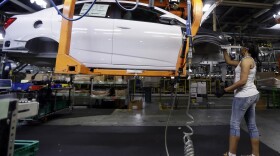  In this June 22, 2015 file  photo, a Buick Verano is assembled at General Motors' Orion Assembly plant in Orion Township, Mich.  (Carlos Osorio/AP)